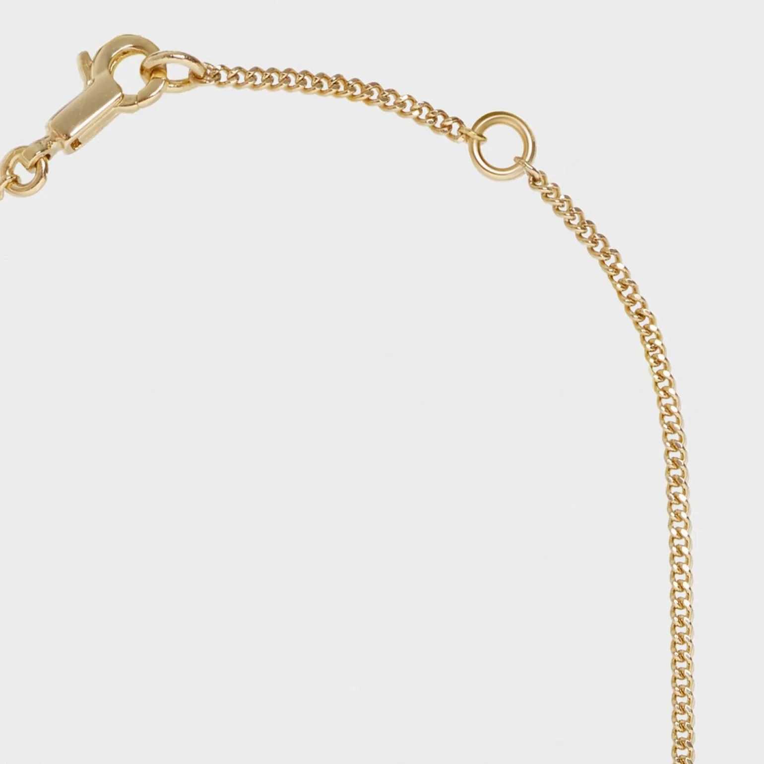 Alphabet Q Necklace in Brass with Gold finish