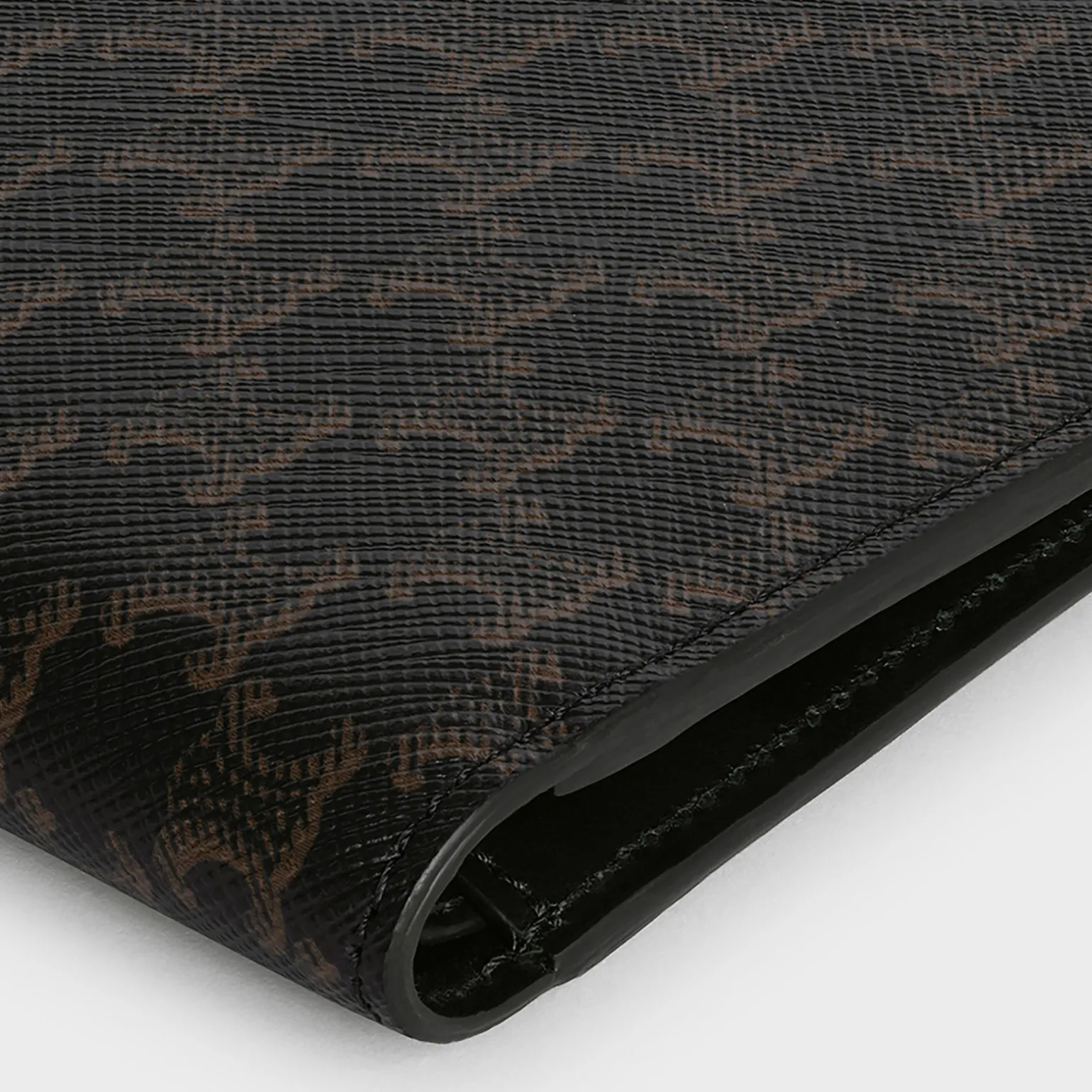 Bi-fold wallet in Triomphe Canvas