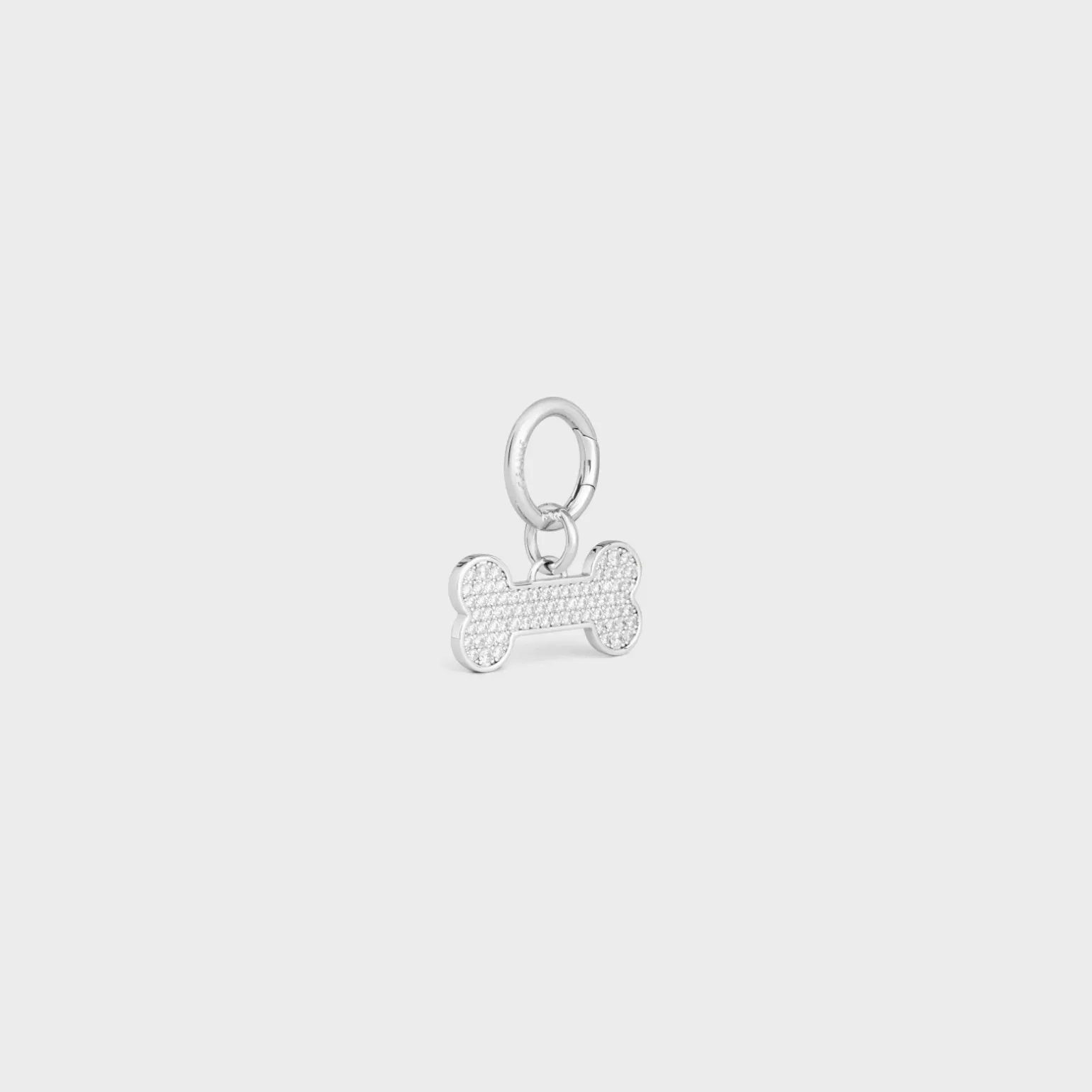 Bone strass dog medal in brass