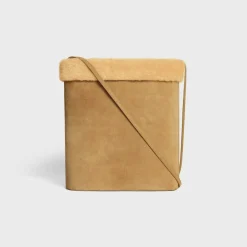 BUCKET in SUEDE CALFSKIN AND SHEARLING