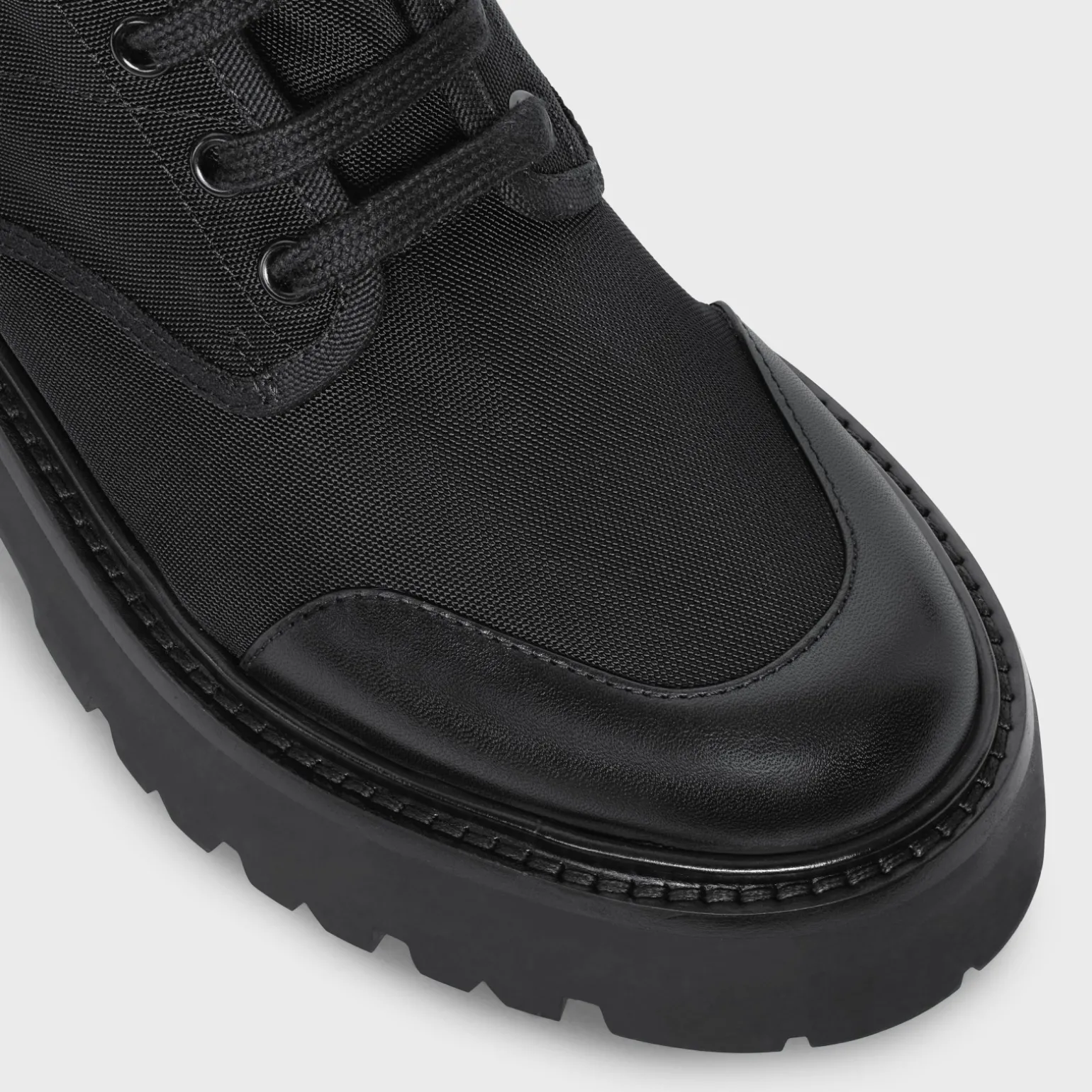 CELINE BULKY LACED UP BOOT in NYLON AND SHINY BULL
