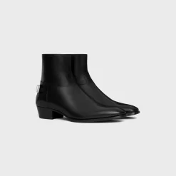CELINE DRUGSTORE BACK BUCKLE ZIPPED BOOT in Shiny calfskin