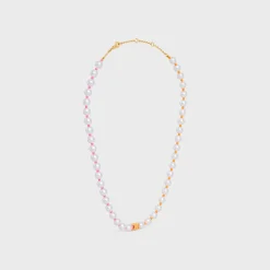 Celine Plage Pearl Necklace in Brass with Gold Finish and Resin Pearls