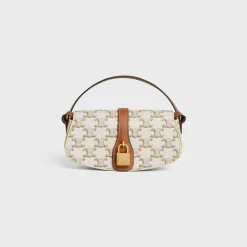 CLUTCH ON STRAP TABOU in Triomphe canvas and calfskin