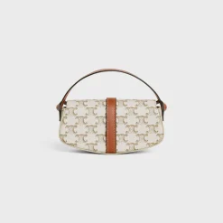 CLUTCH ON STRAP TABOU in Triomphe canvas and calfskin