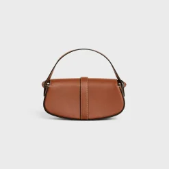 CLUTCH ON STRAP TABOU in Smooth calfskin
