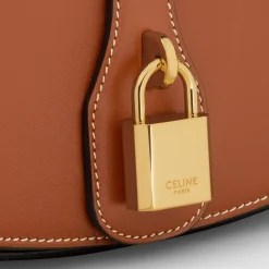 CLUTCH ON STRAP TABOU in Smooth calfskin