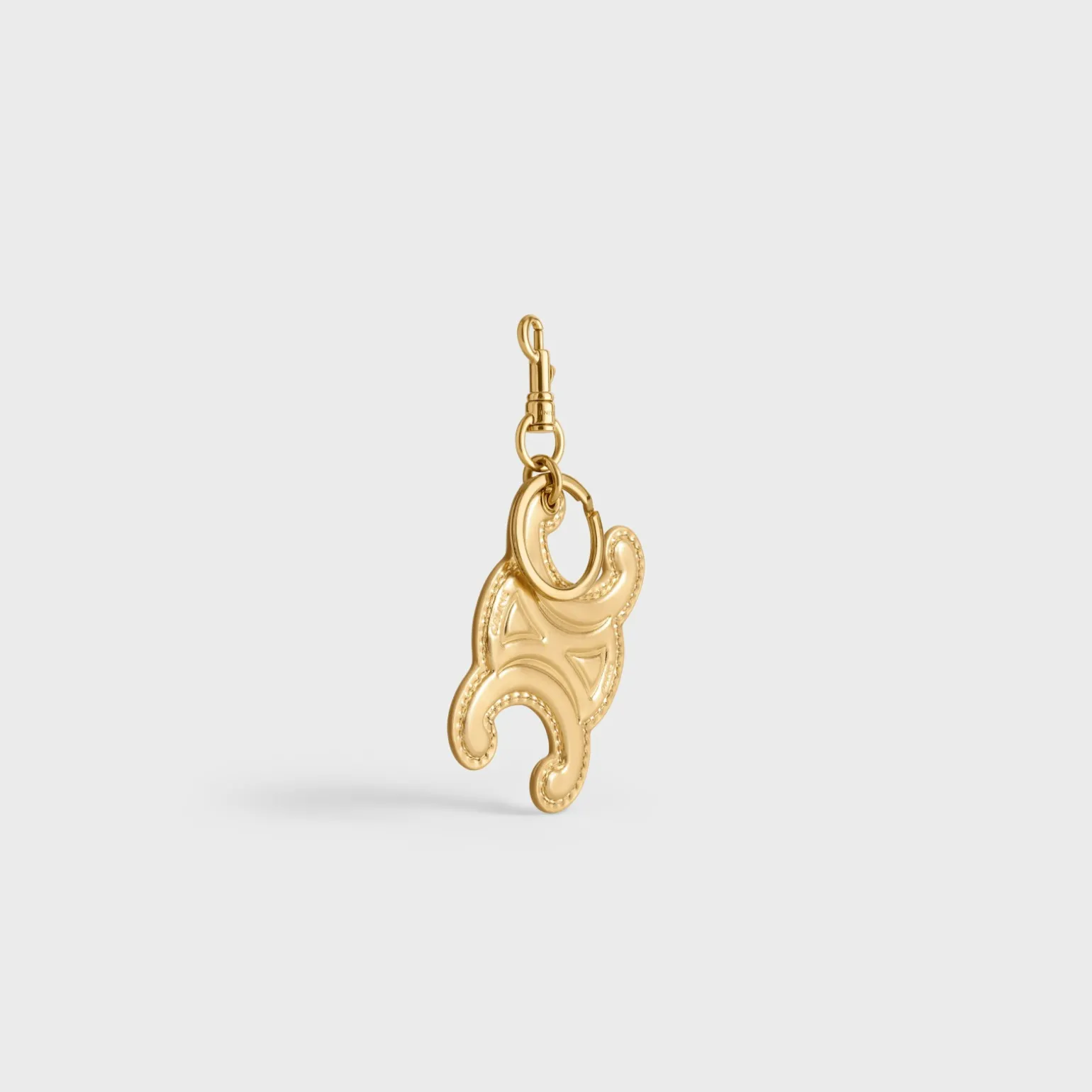 KEYRING TRIOMPHE CHARM in LAMINATED CALFSKIN with GOLD FINISHING