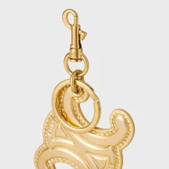 KEYRING TRIOMPHE CHARM in LAMINATED CALFSKIN with GOLD FINISHING