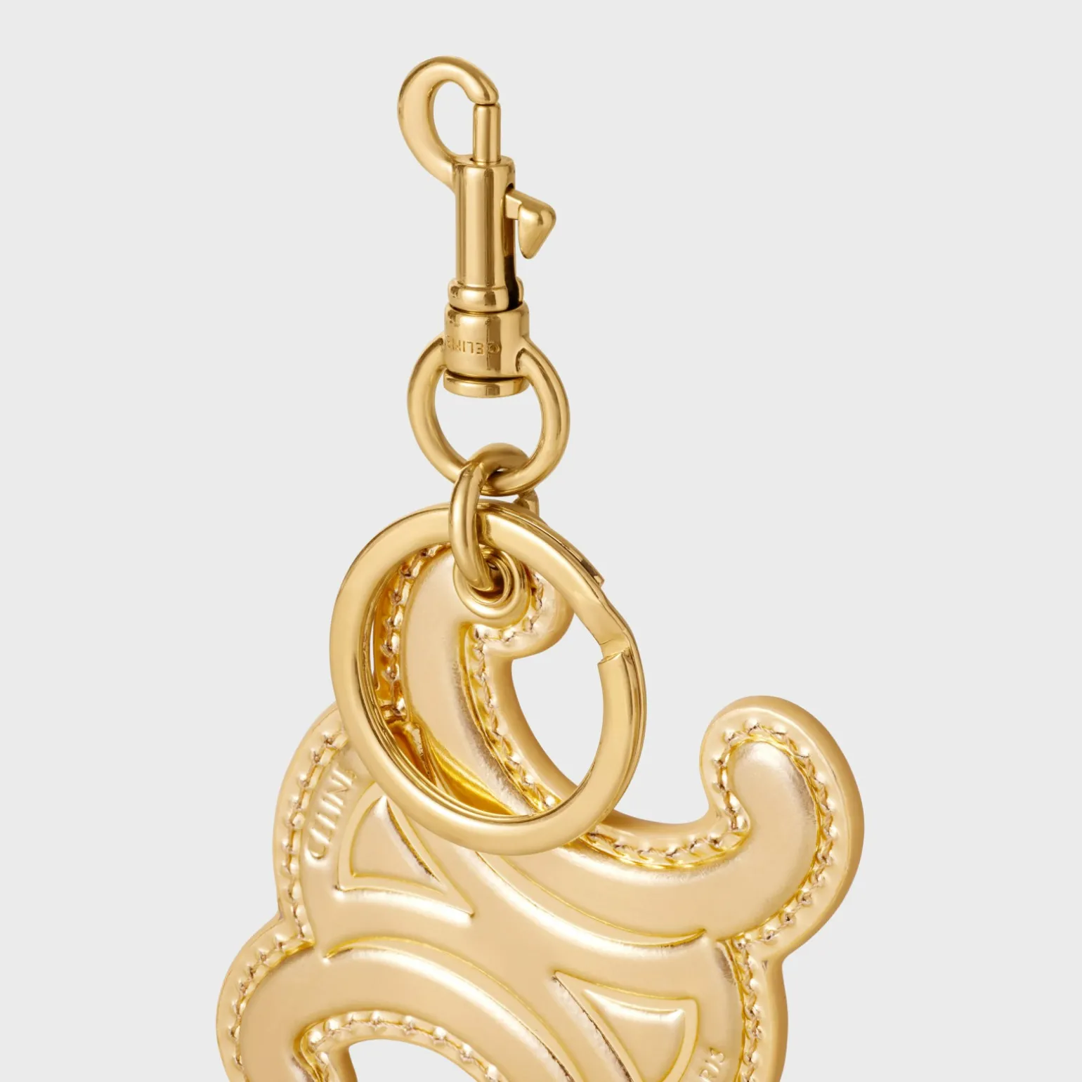 KEYRING TRIOMPHE CHARM in LAMINATED CALFSKIN with GOLD FINISHING