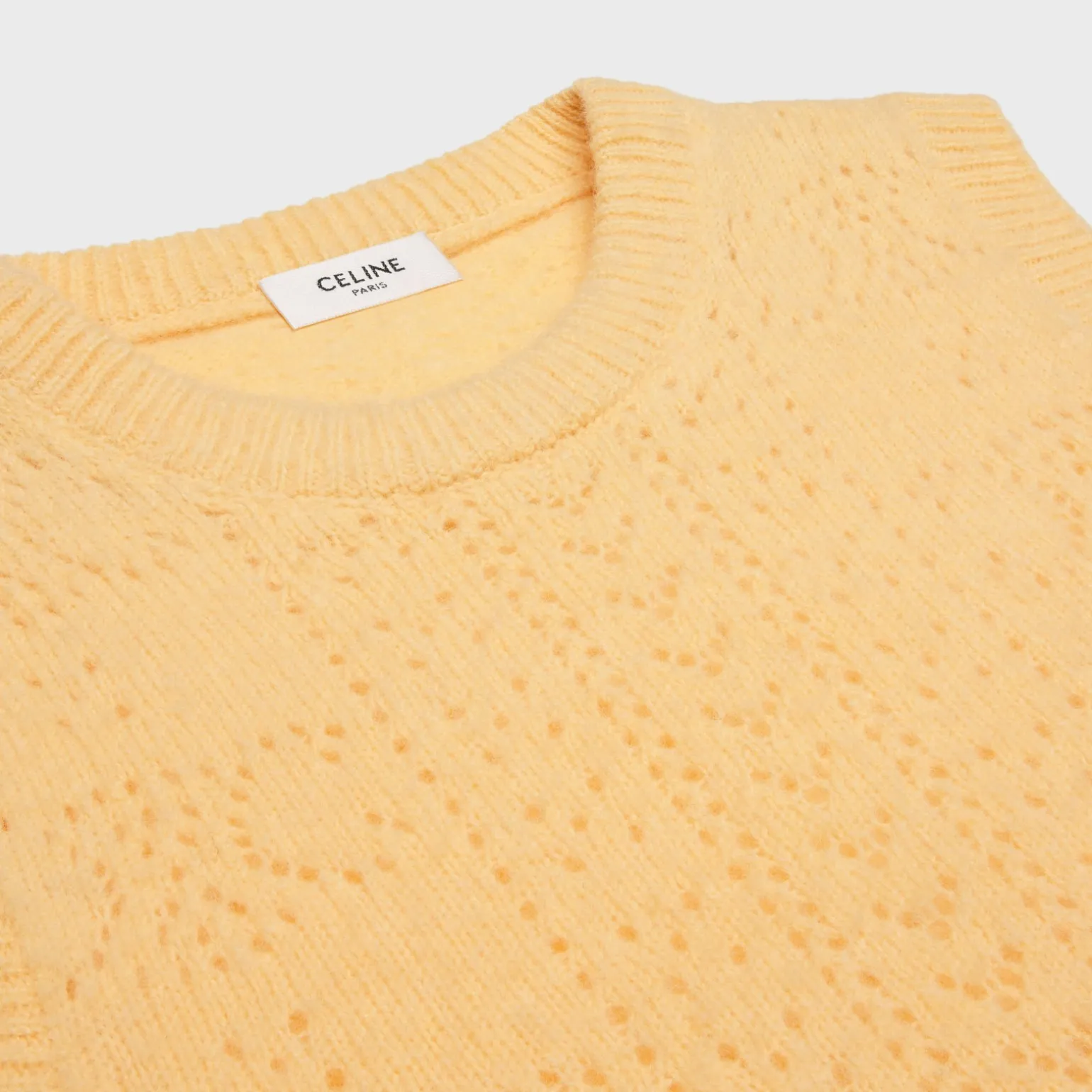 sleeveless sweater in Shetland pointelle