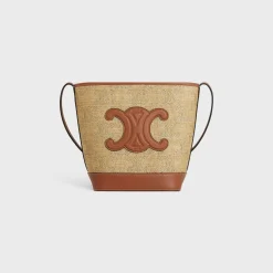 SMALL BUCKET CUIR TRIOMPHE in raffia effect textile with triomphe jacquard