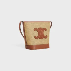 SMALL BUCKET CUIR TRIOMPHE in raffia effect textile with triomphe jacquard