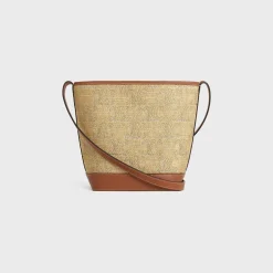 SMALL BUCKET CUIR TRIOMPHE in raffia effect textile with triomphe jacquard