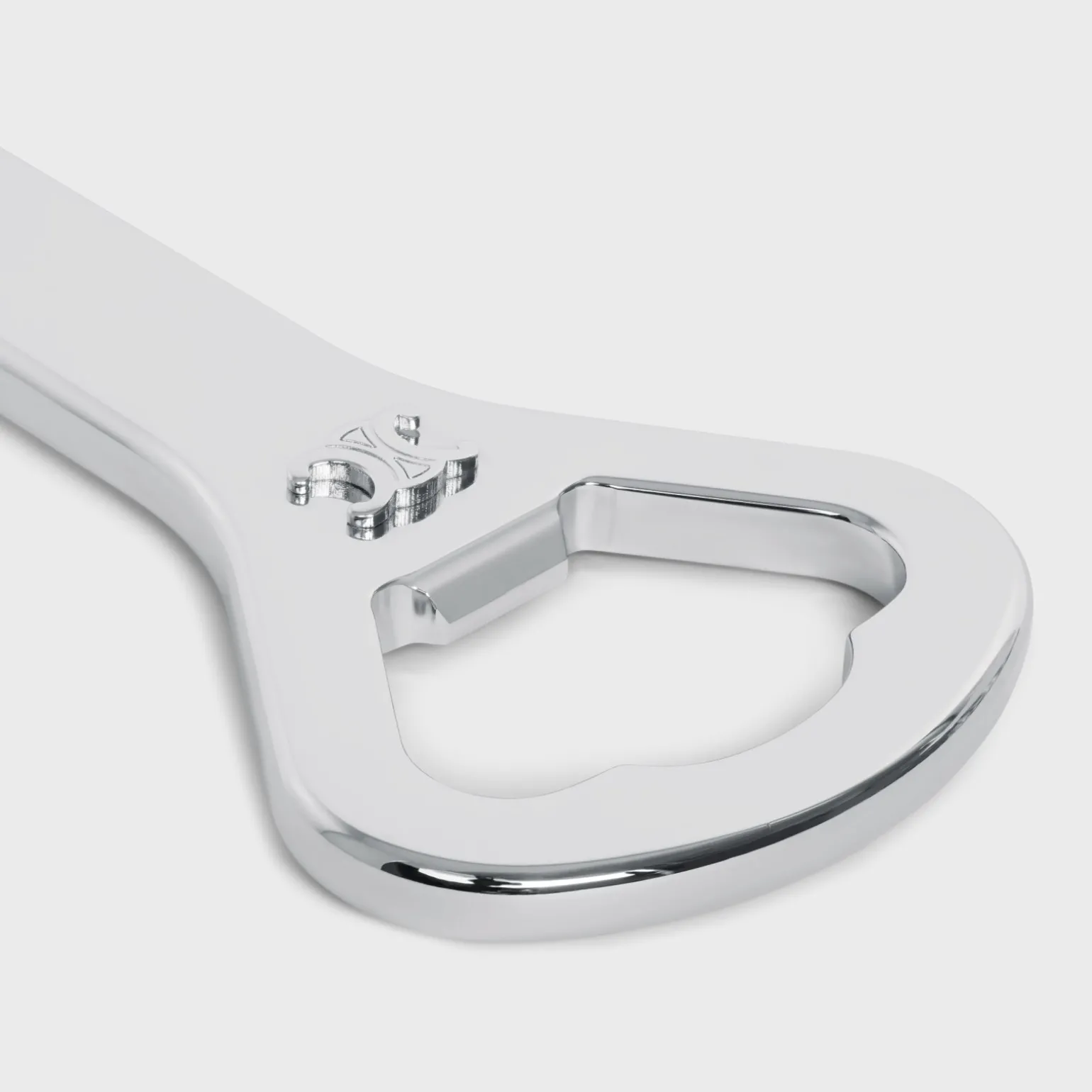 Triomphe Bottle Opener in Steel and calfskin