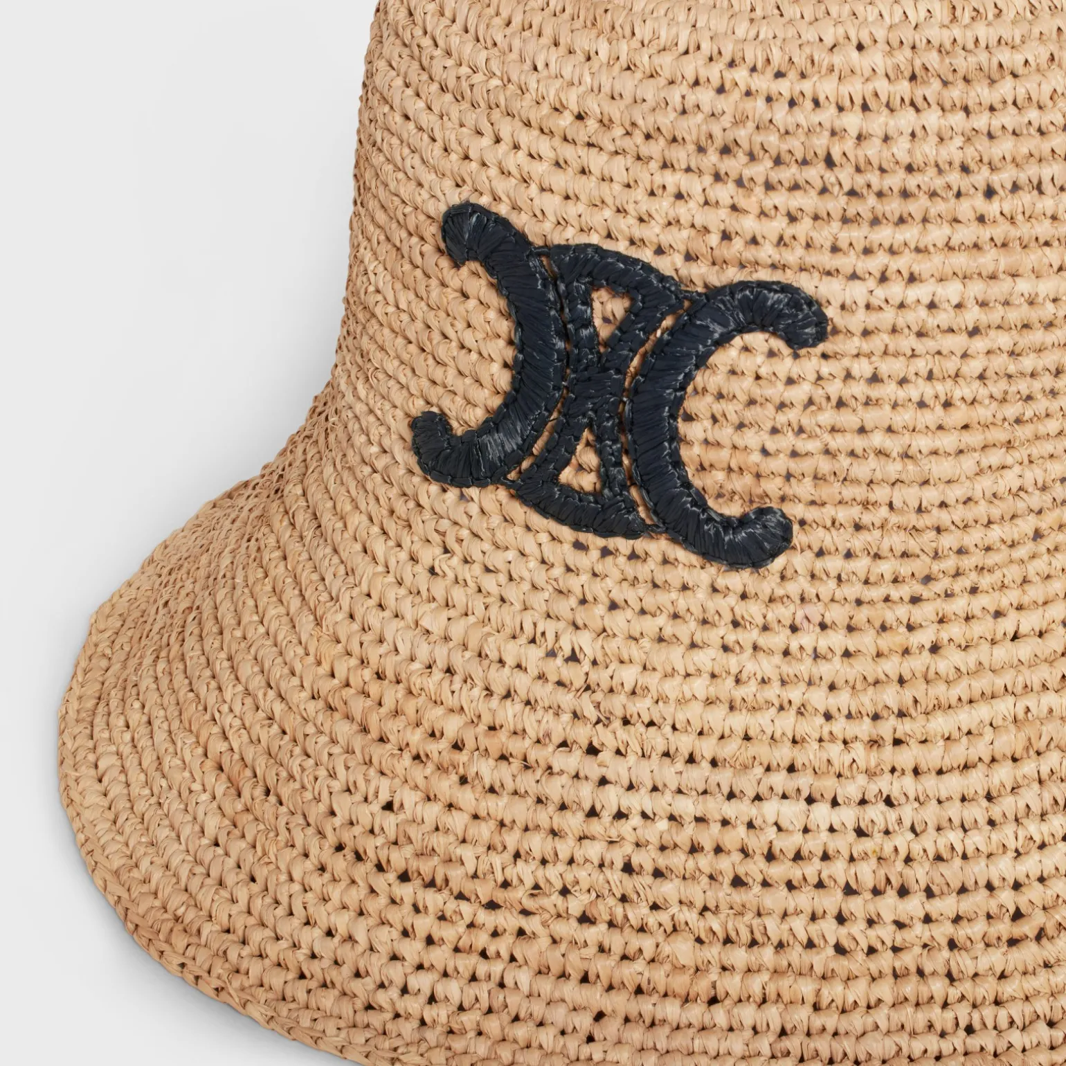 triomphe bucket hat in raffia
