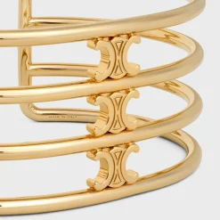 Triomphe Cage Cuff in Brass with Gold Finish