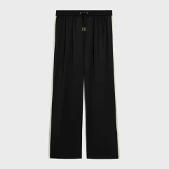triomphe jogging pants in flowing satin
