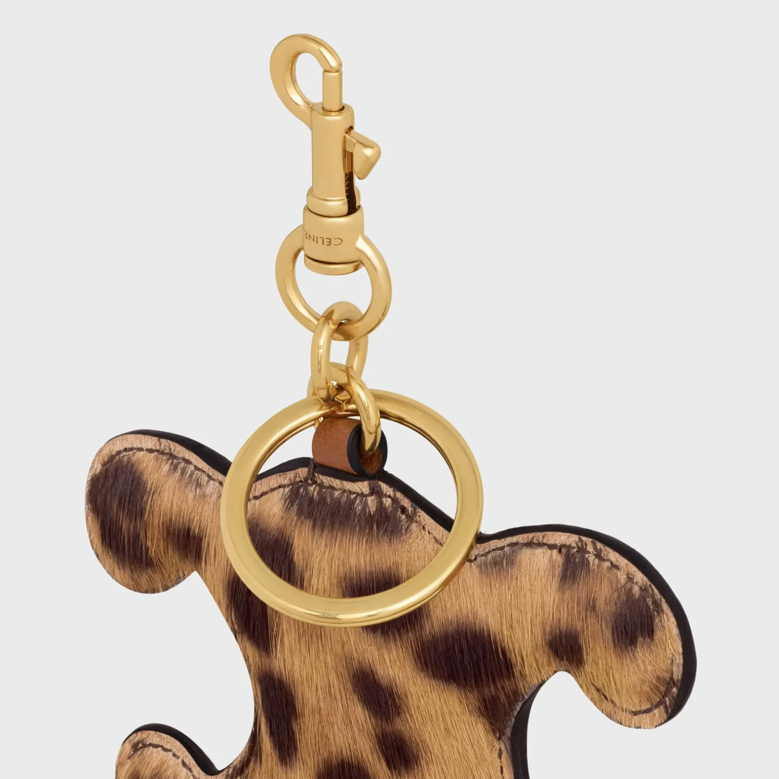 TRIOMPHE pom-pom keyring in PONY WITH LEOPARD PRINT AND CALFSKIN