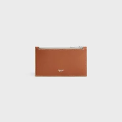 Zipped card holder in Triomphe canvas AND calfskin