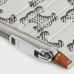Zipped card holder in Triomphe canvas AND calfskin