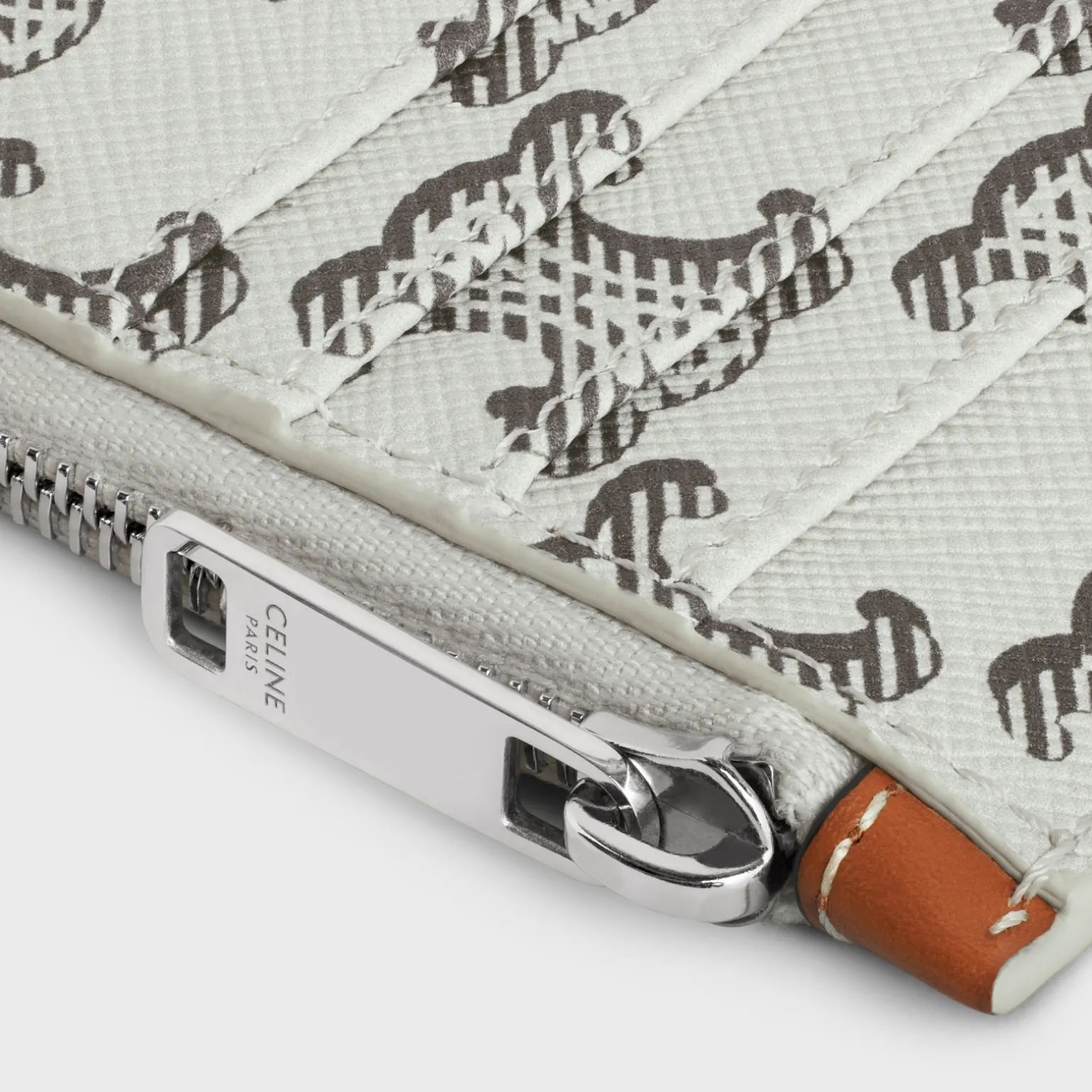 Zipped card holder in Triomphe canvas AND calfskin